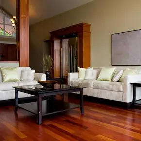 Hardwood floor refinishing project Nassau County living room