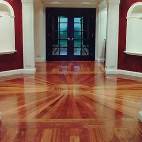 Hardwood floor sanding and refinishing Nassau County hallway